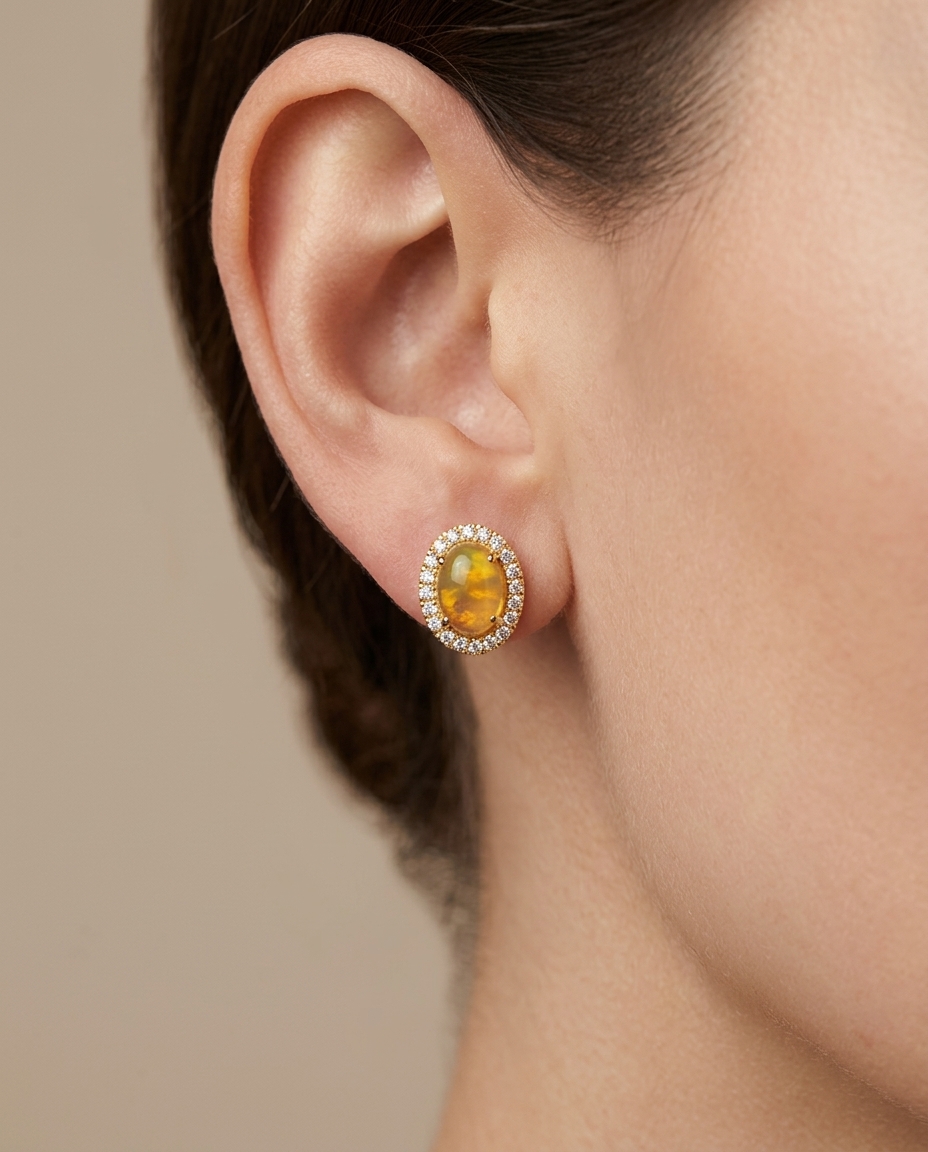 14KT Gold Diamond Ethiopian Opal Oval Shape Earring on model