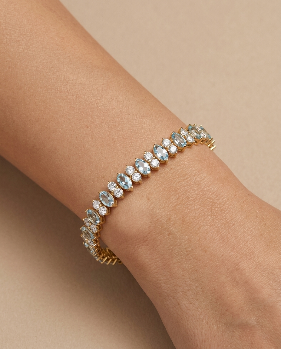 14KT Yellow Gold Marquise Shape Aquamarine and Diamonds Tennis Bracelet on model