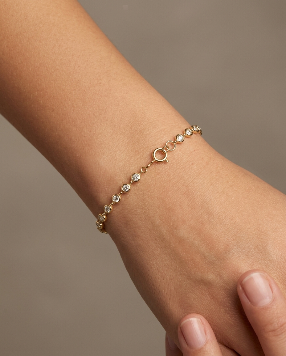 14KT Gold Bezeled Diamond Station Bracelet on model