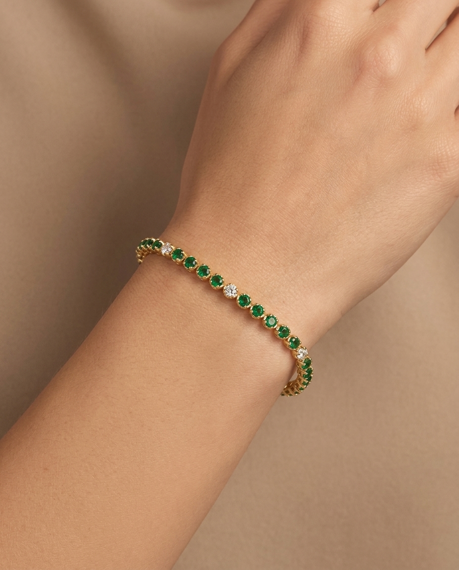 14KT Yellow Gold Emerald and Diamond Tennis Bracelet on model