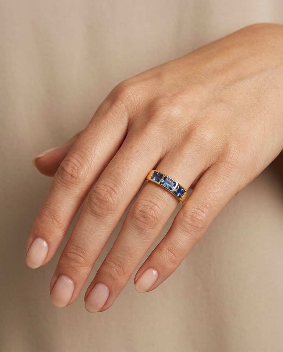 14KT Yellow Gold Blue Sapphire Ring on model