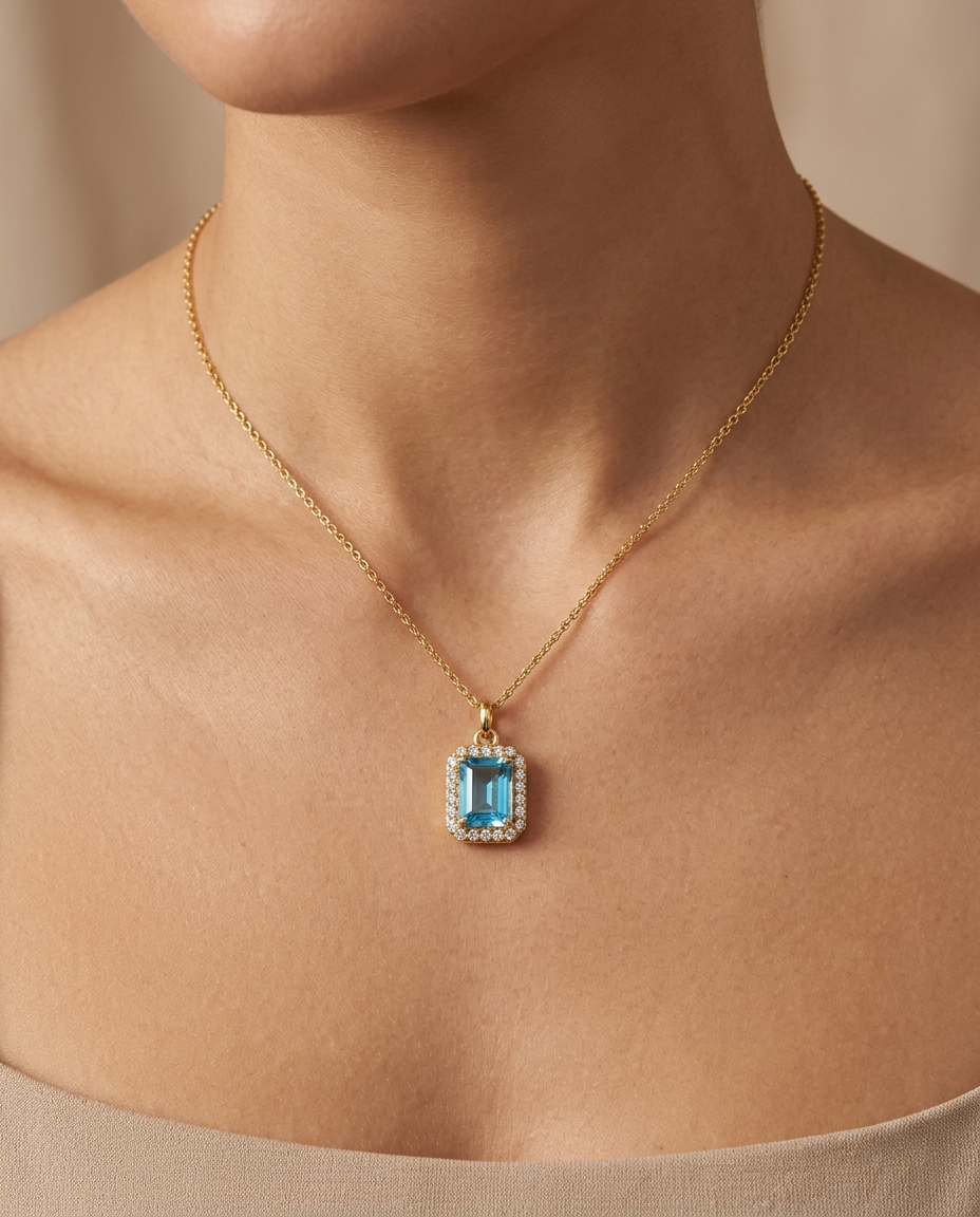 14KT Yellow Gold Pendant with Diamonds and Blue Topaz on model
