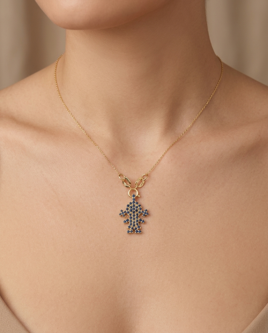 14KT Yellow Gold Girl Pendant with Blue Sapphire on model