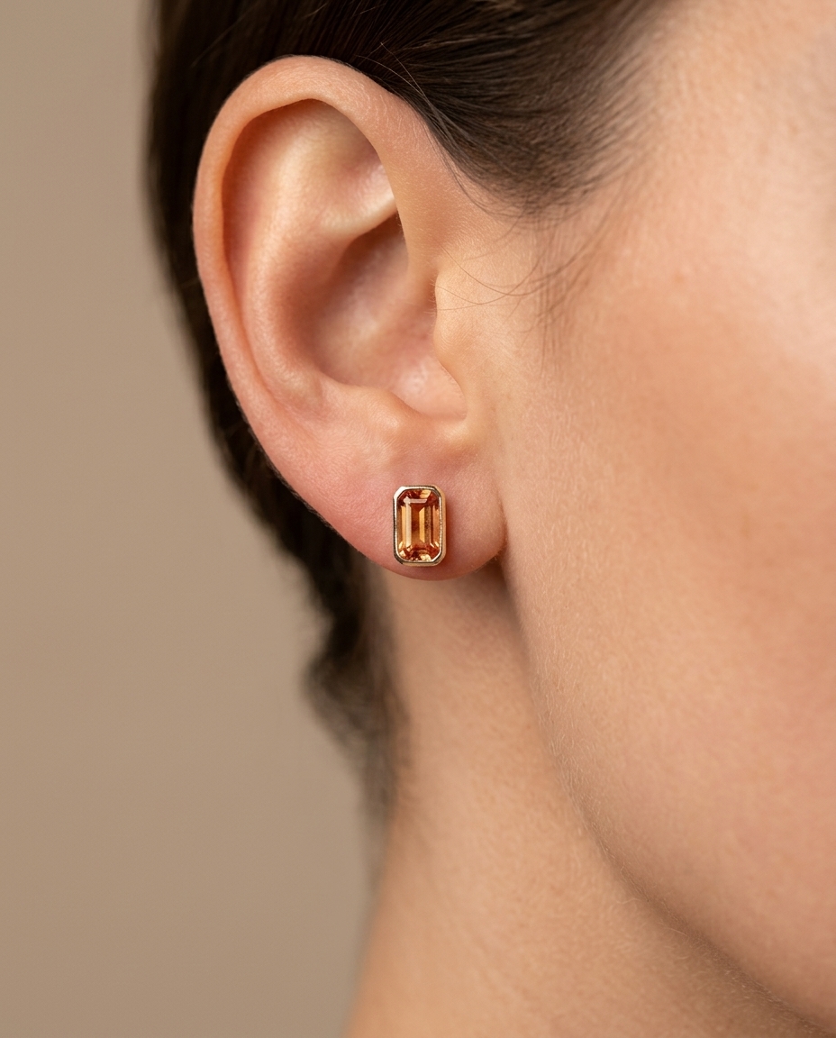 14KT Yellow Gold Orange Sapphire Earring Studs on model