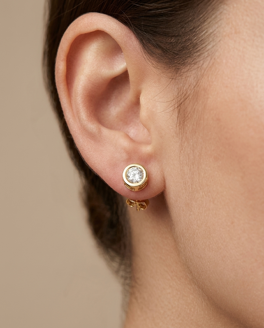 14KT Yellow Gold Bezel Set Diamond Stud Earring on model