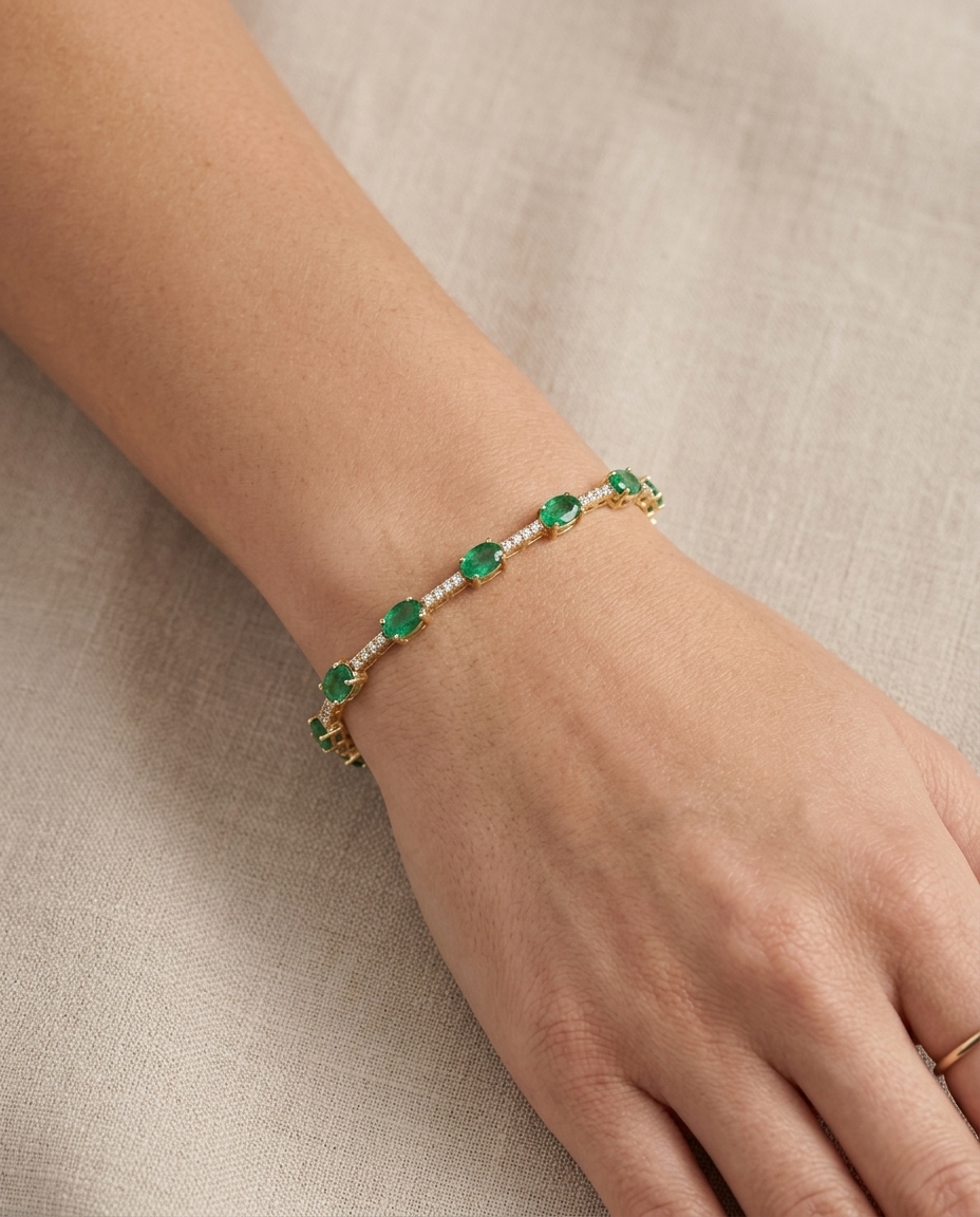 14KT Gold Emerald and Diamonds Bracelet on model