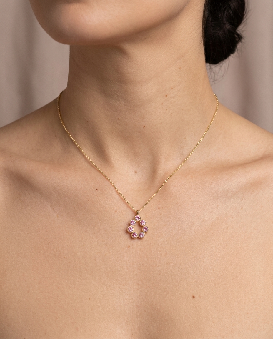 14KT Gold Pink Sapphire Pendant on model