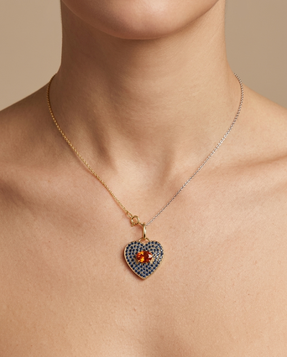 14KT Yellow Gold Heart Pendant Withblue and Orange Sapphire on model