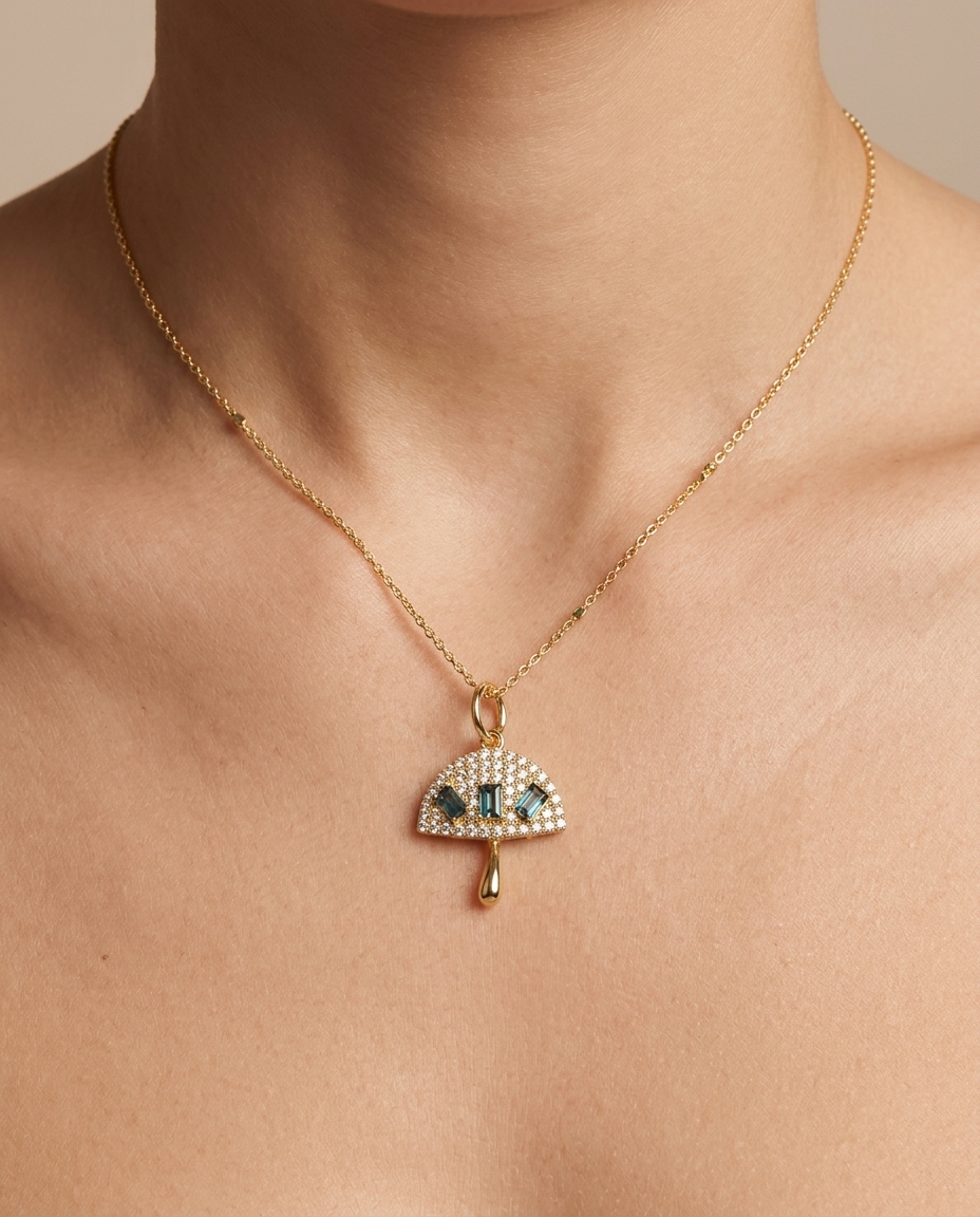14KT Yellow Gold Mushroom Pendant with Blue Sapphire and Diamonds on model