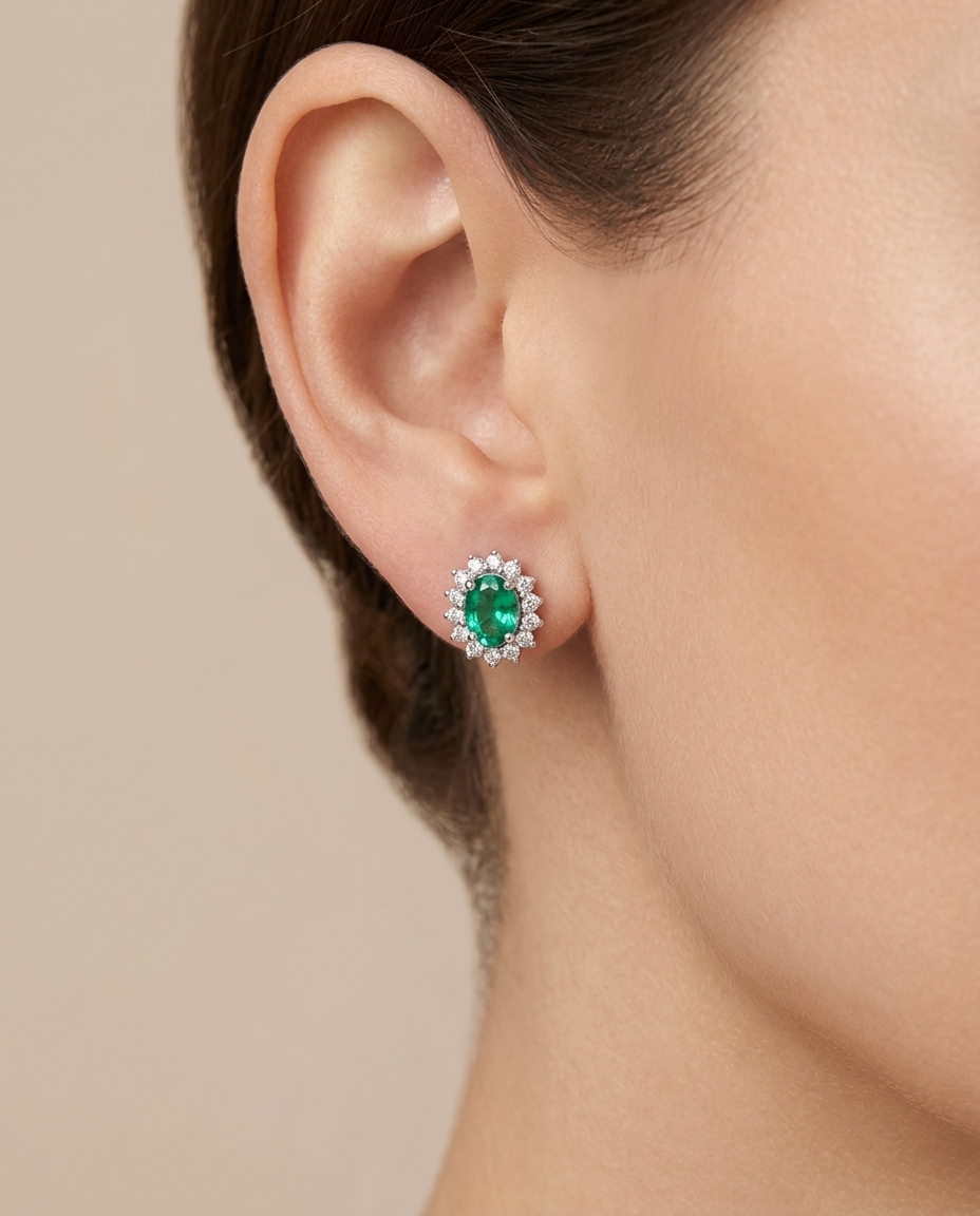18KT White Gold Emerald and Diamonds Earing on model