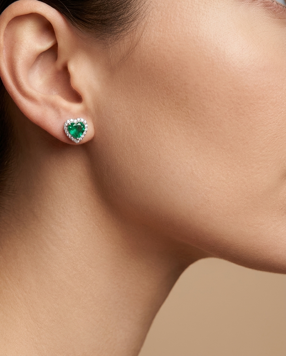 18KT White Gold Heart Shape Emerald and Diamonds Earring on model