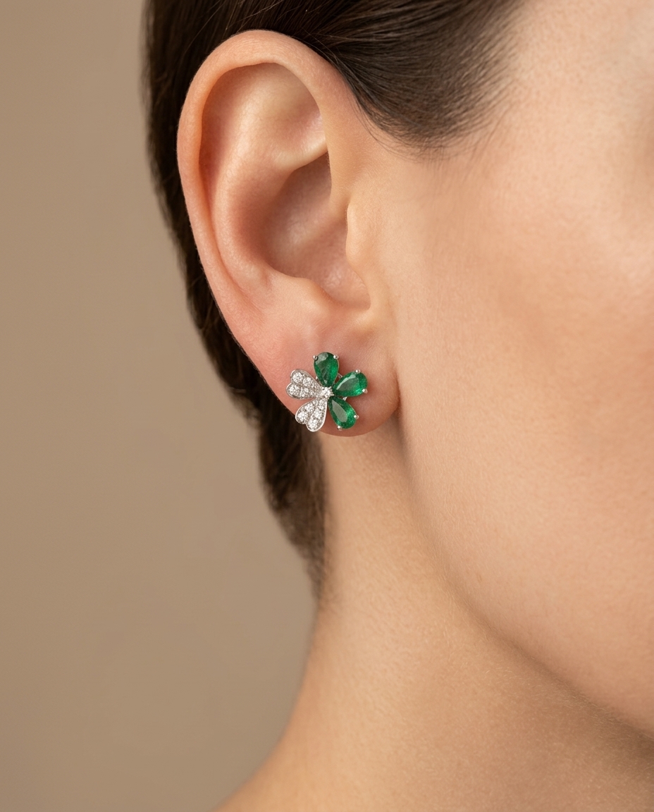 18KT White Gold Emerald and Diamond Earring on model