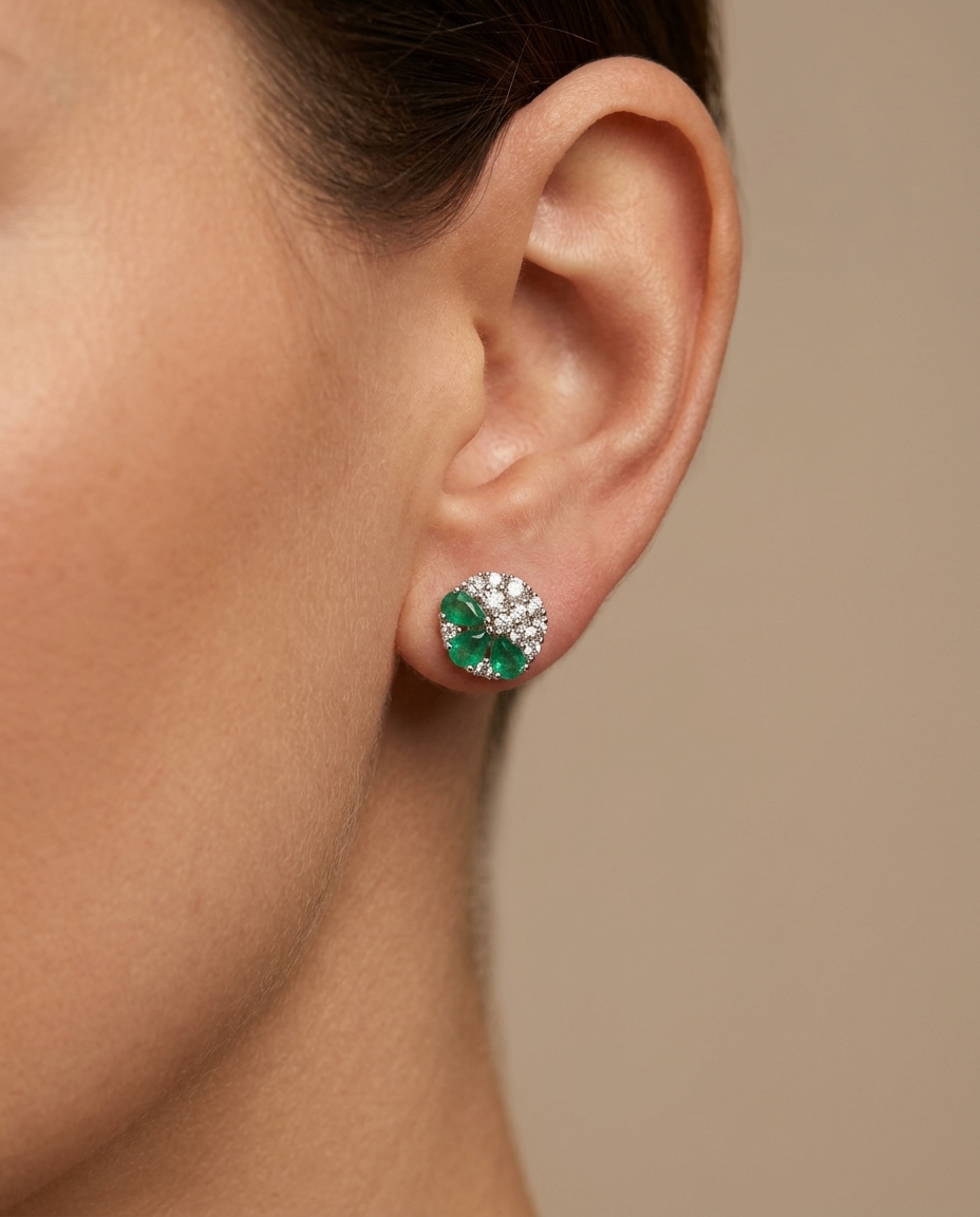 18KT White Gold Emerald and Diamond Earring on model