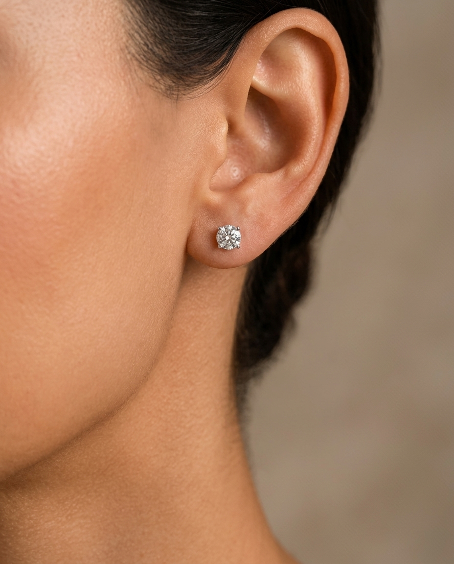 14KT Gold Solitaire Diamond Studs 4 Prong on model