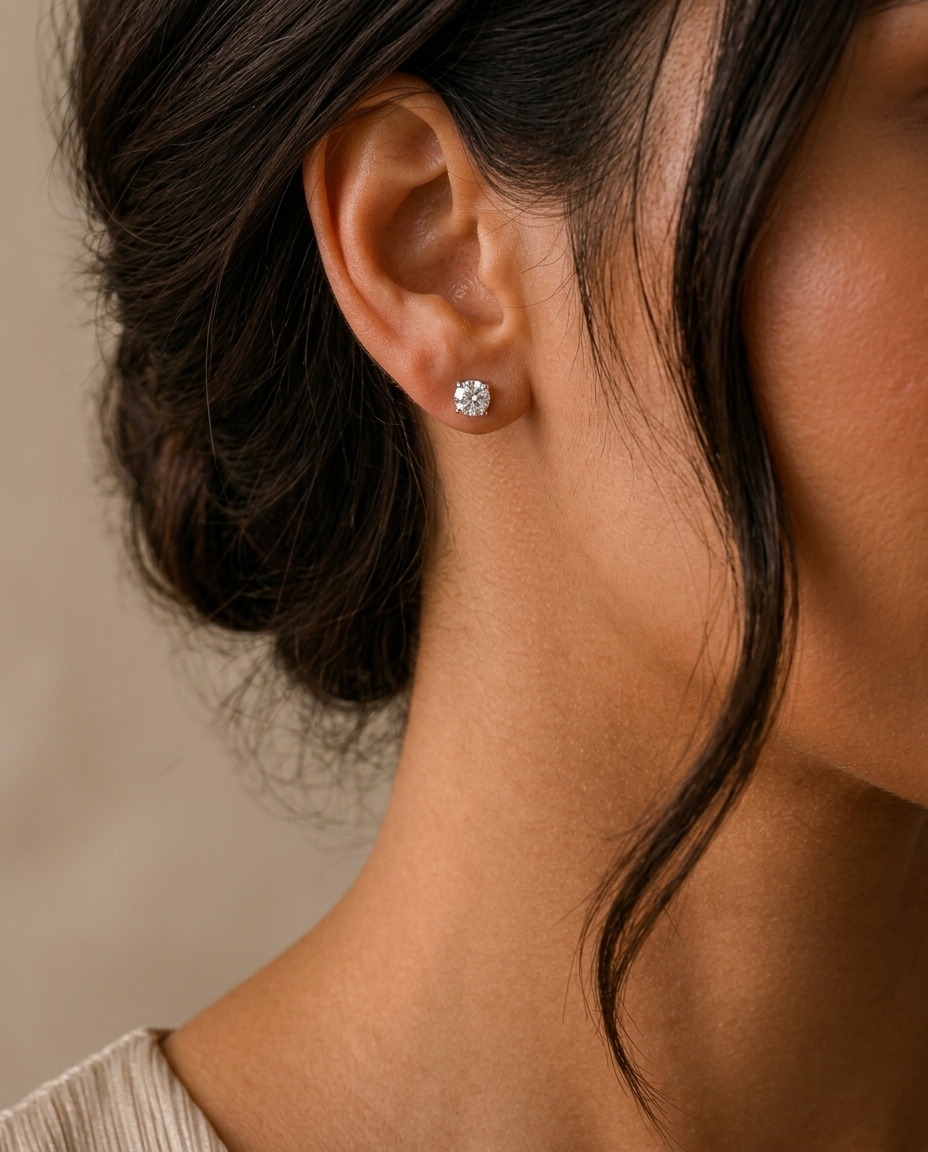 14KT Gold Solitaire Diamond Studs 4 Prong on model
