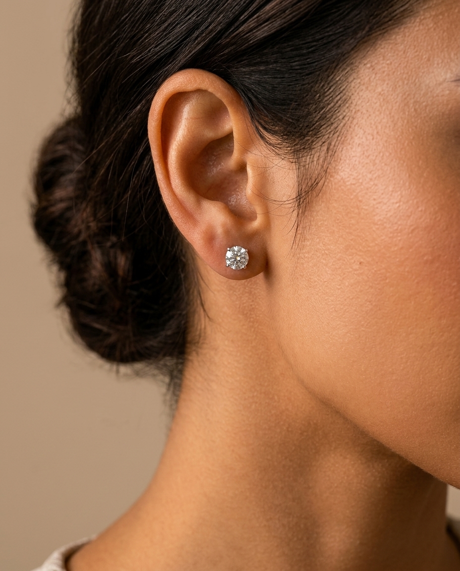 14KT Gold Solitaire Diamond Studs 4 Prong on model