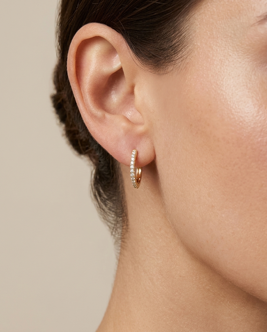 14KT Gold Diamond Huggies Earring on model