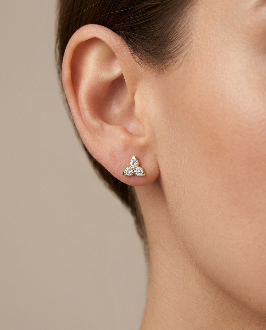 14KT Gold Diamond Star Ear Studs on model
