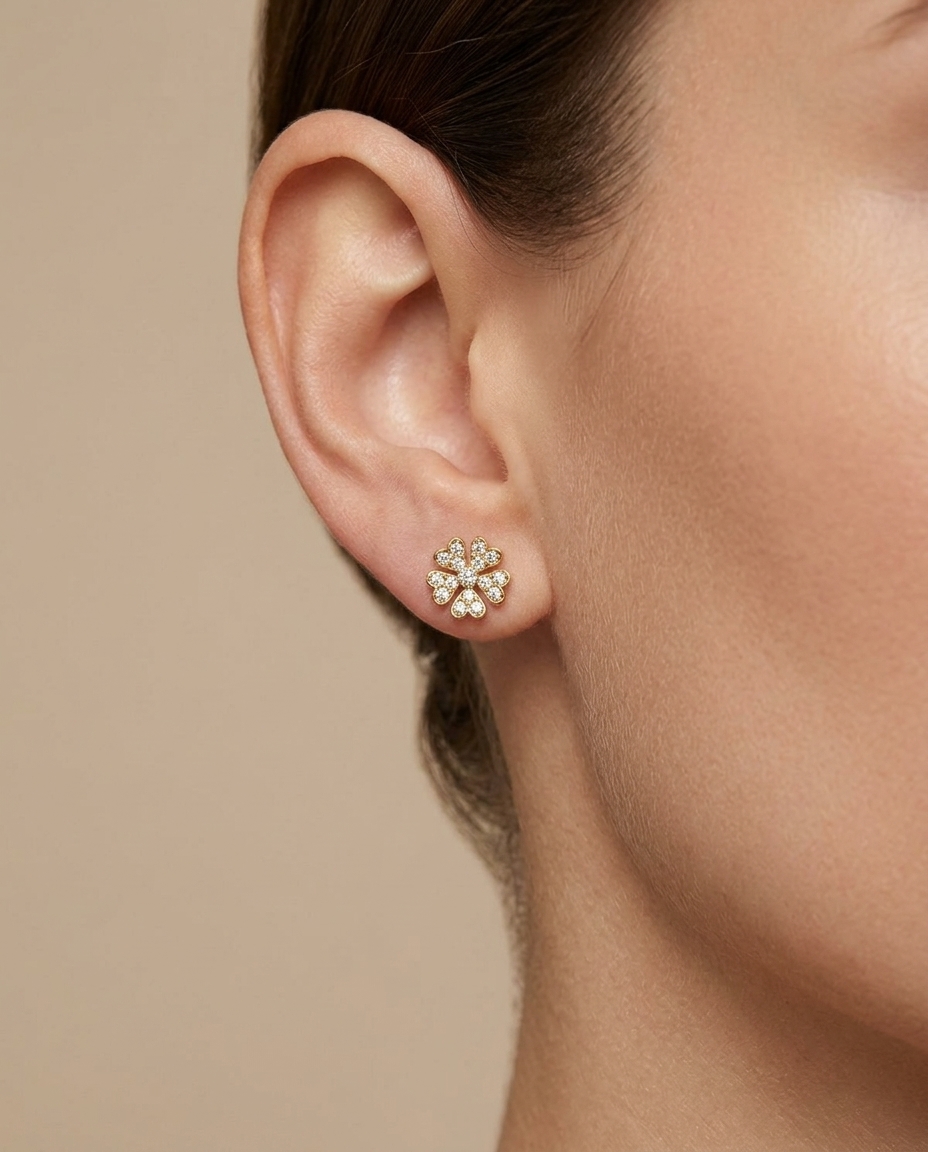 14KT Gold Star / Flower Diamond Earring on model