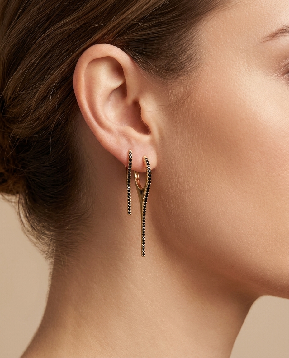 14KT Gold Black Diamond Spike Huggies on model