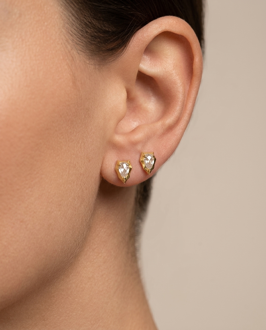 14KT Gold Pear Shape Diamond Earring on model