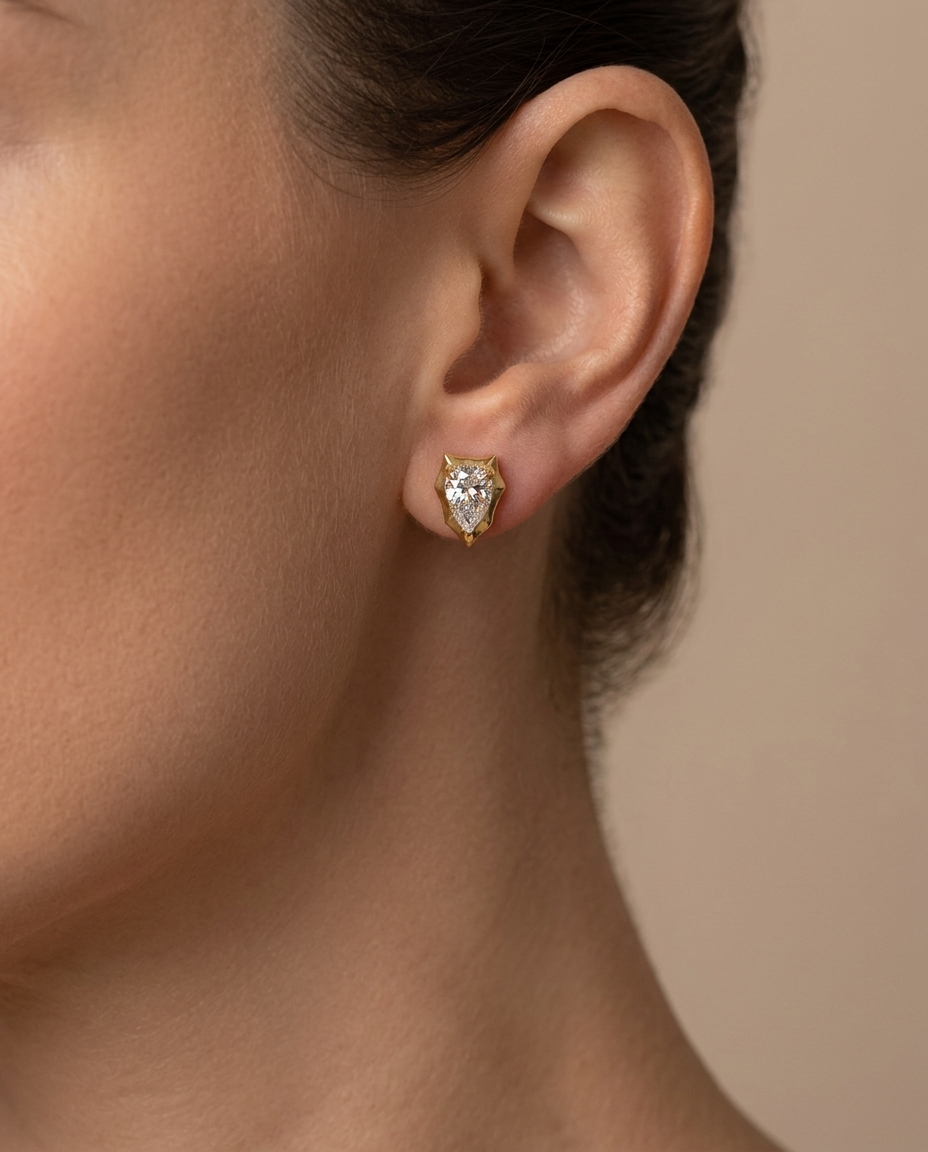 14KT Gold Pear Shape Diamond Earring on model