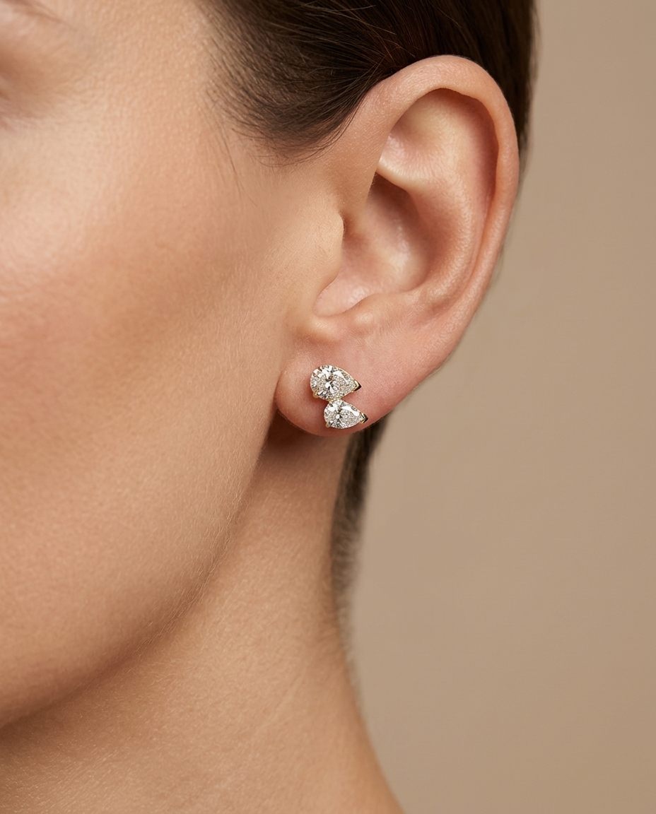 14KT Gold Pear Shape Diamond Earrings on model