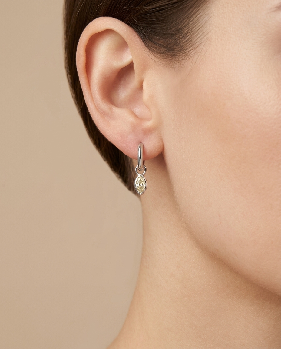 14KT White Gold Huggies with Hanging Diamond on model