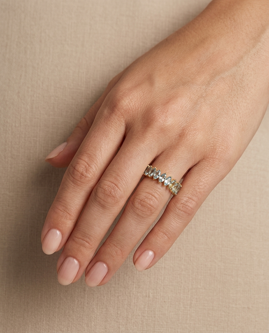 14KT Yellow Gold Marquise Shape Aquamarine Eternity Band on model