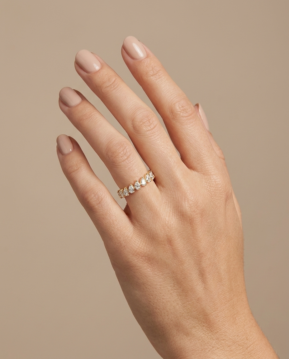 14KT Gold Ring with Pear Shape Diamonds on model
