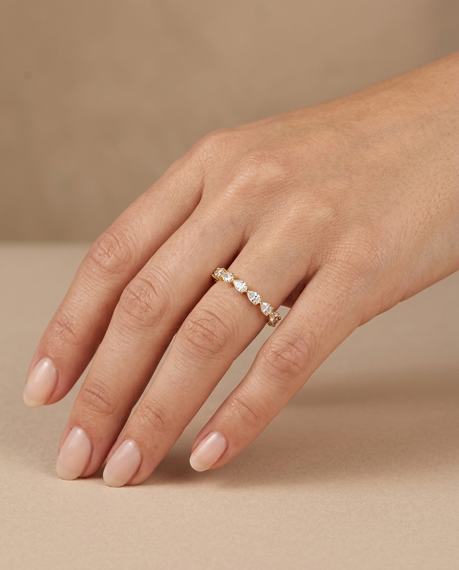 14KT Gold Ring with Pear Shape Diamonds on model
