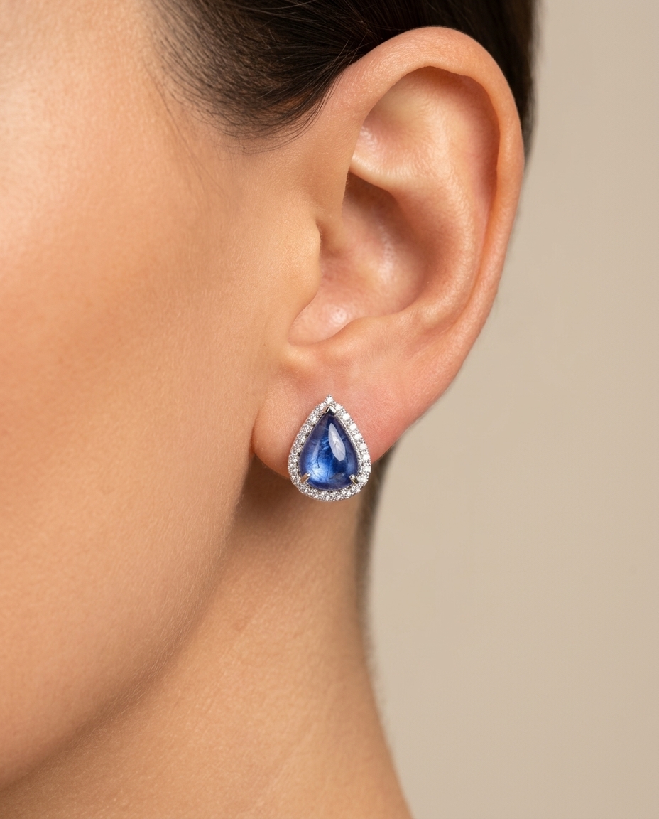 14KT White Gold Pear Shape Tanzanite and Diamond Ring on model