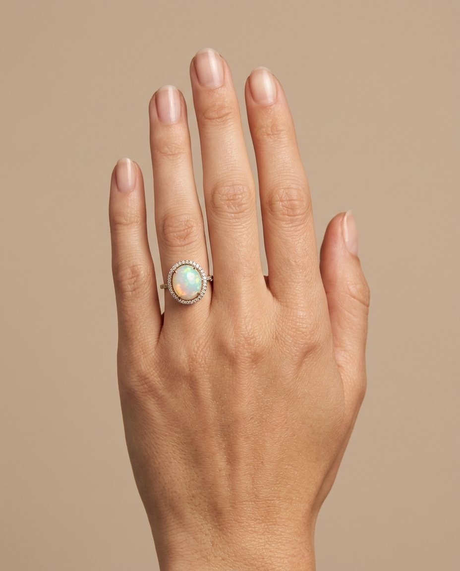 14KT Yellow Gold Opal Oval Ring with Diamonds on model