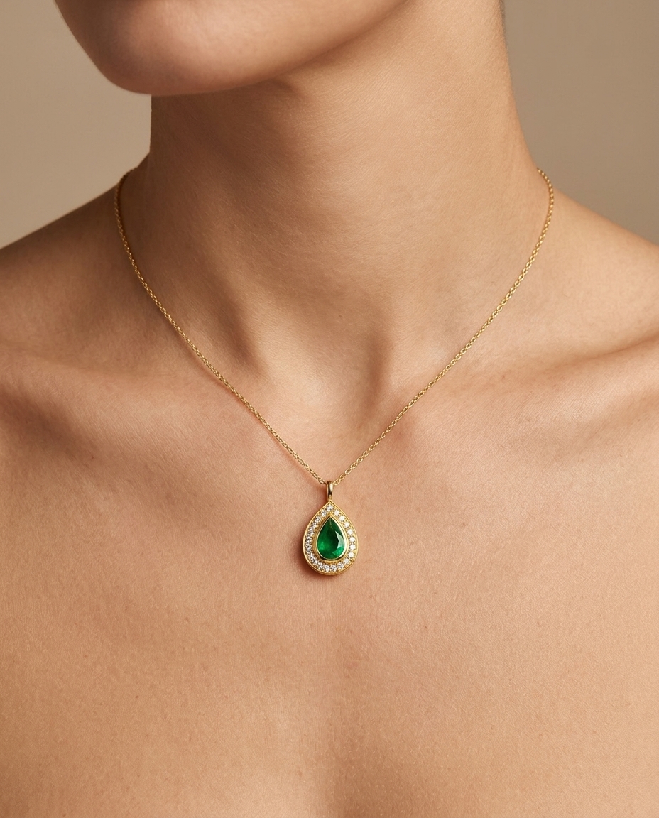 14KT Yellow Gold Emerald Pear Pendant on model
