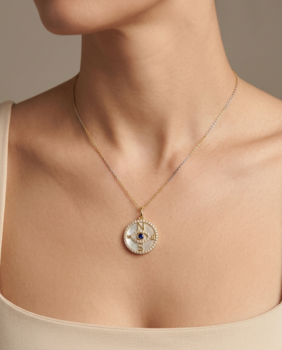 14KT Yellow Gold Mother of Pearl and Sapphire Evil Eye Compass Pendant with Diamonds on model