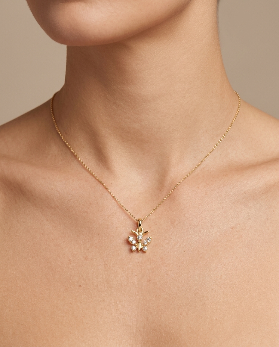 18KT Yellow Gold Butterfly Pendant with Diamonds on model