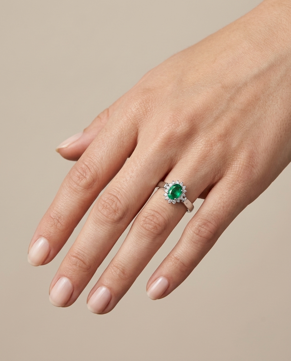 18KT White Gold Emerald and Diamonds Ring on model