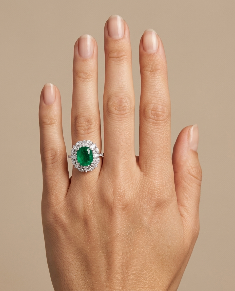 18KT White Gold Emerald and Diamonds Ring on model