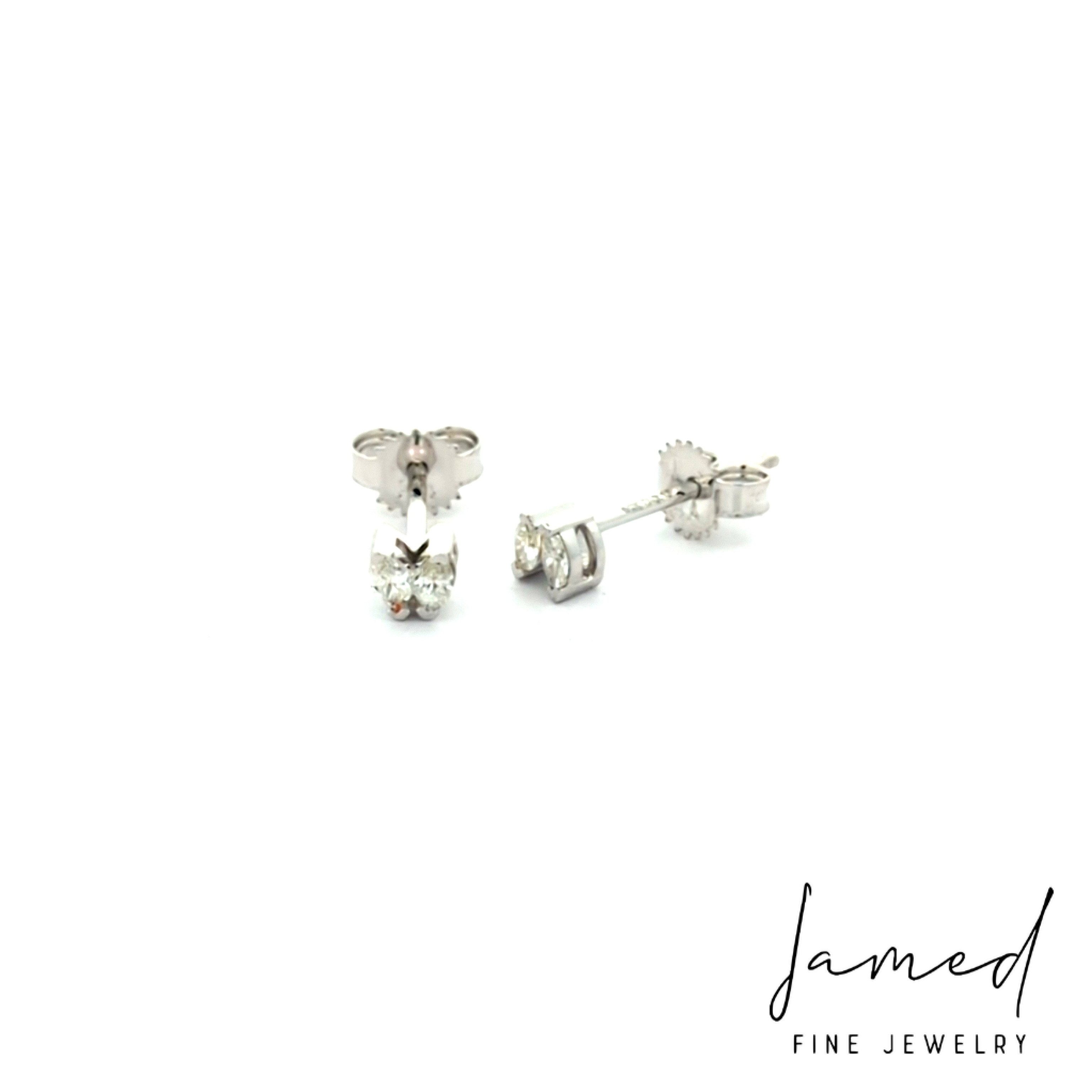 Diamond Earrings . in White Gold