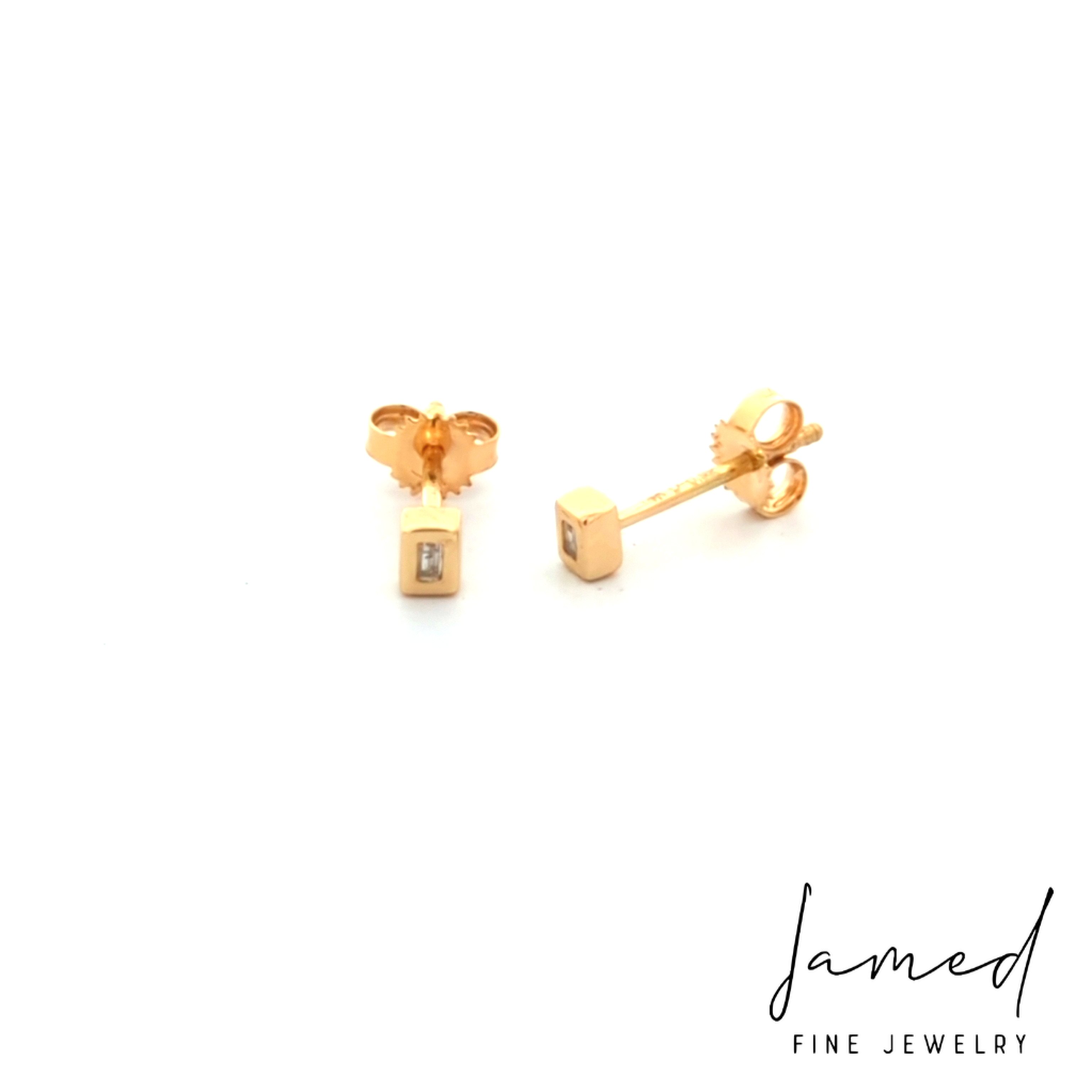 Baguette Bezeled Ear Stud . in Yellow Gold